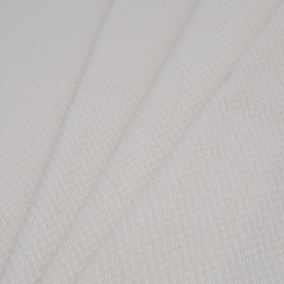 Spanish Natural Raised Checks Polyester Blended Woven - Folded Spanish Natural Raised Checks Polyester Blended Woven - Folded
