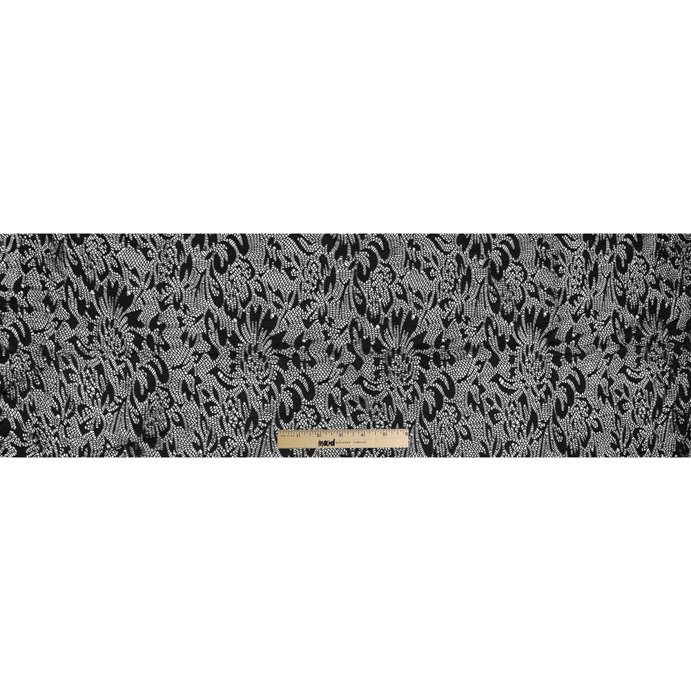 Italian Black Laminated Crochet Lace Folded Italian Black Laminated Crochet Lace Folded