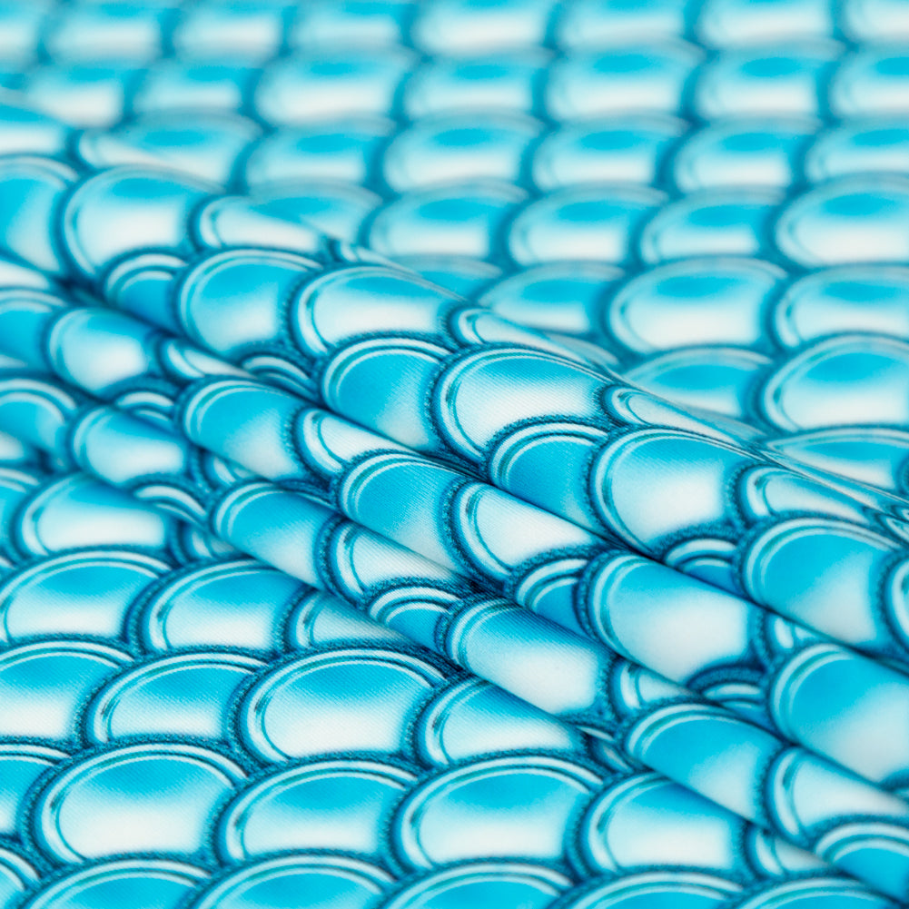 Compression Swimwear Tricot, UV Protective with Aloe Vera Microcapsules - Cerulean Blue Coins - Caye Collection Folded Compression Swimwear Tricot, UV Protective with Aloe Vera Microcapsules - Cerulean Blue Coins - Caye Collection Folded