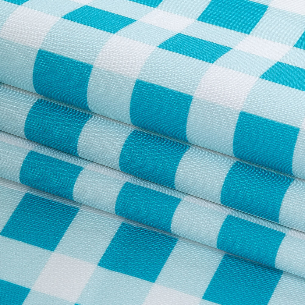 Compression Swimwear Tricot, UV Protective with Aloe Vera Microcapsules - Blue and White Checkered - Caye Collection - Folded Compression Swimwear Tricot, UV Protective with Aloe Vera Microcapsules - Blue and White Checkered - Caye Collection - Folded