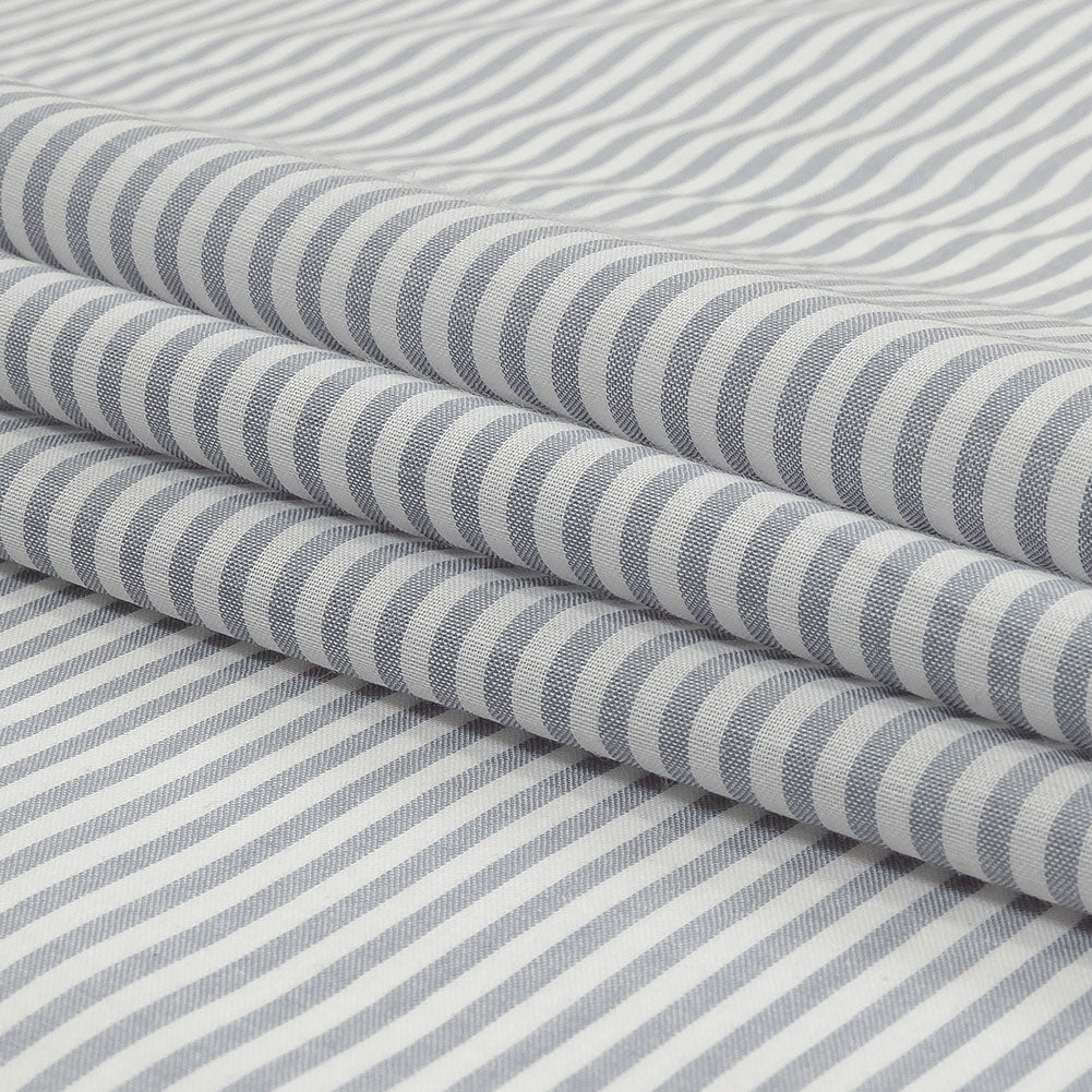 White and Blue Gray Candy Striped Cotton and Polyester Shirting Folded White and Blue Gray Candy Striped Cotton and Polyester Shirting Folded