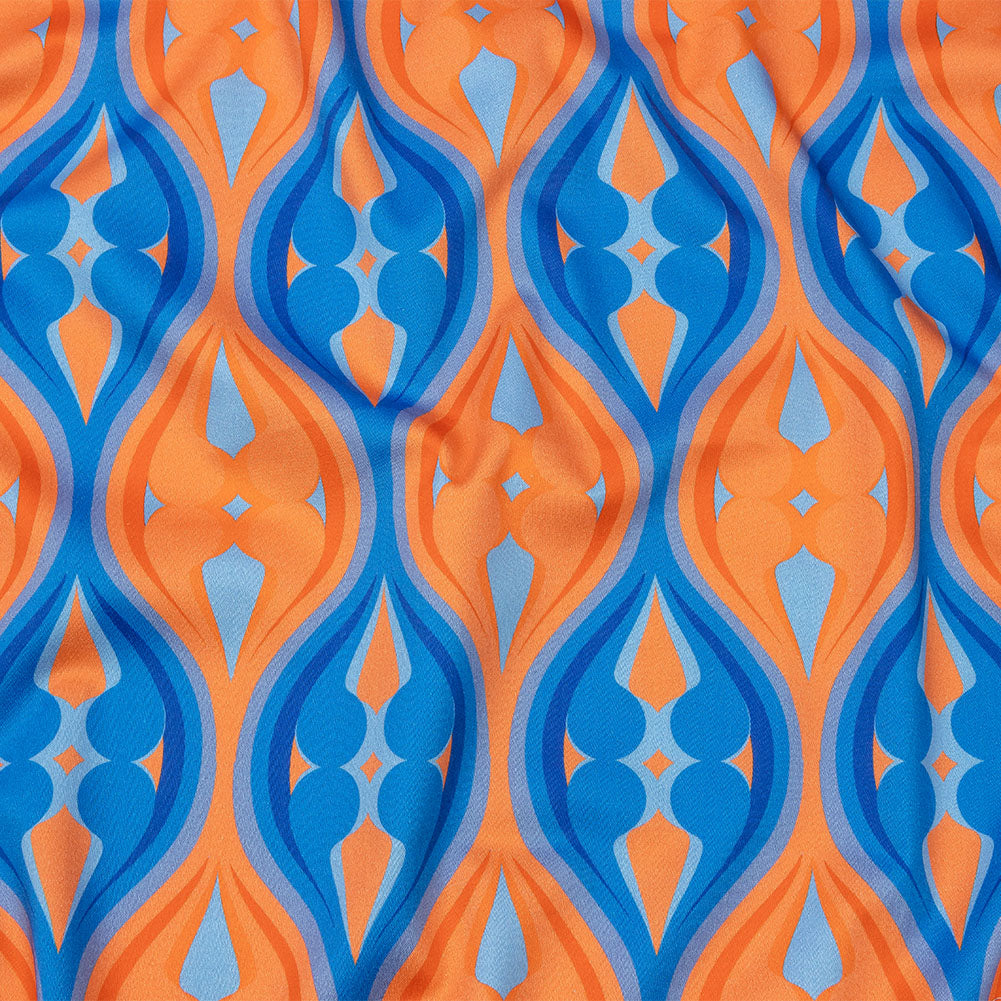 Stretch Cotton Sateen - Blue and Orange Ogees - Eye of the Storm Print - Mood Exclusive Groove Collection Stretch Cotton Sateen - Blue and Orange Ogees - Eye of the Storm Print - Mood Exclusive Groove Collection