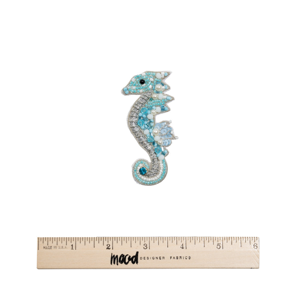 Aqua, Silver and White Baby Seahorse Sequins and Glass Beaded Applique - 3.125" x 1.375" Full Aqua, Silver and White Baby Seahorse Sequins and Glass Beaded Applique - 3.125" x 1.375" Full