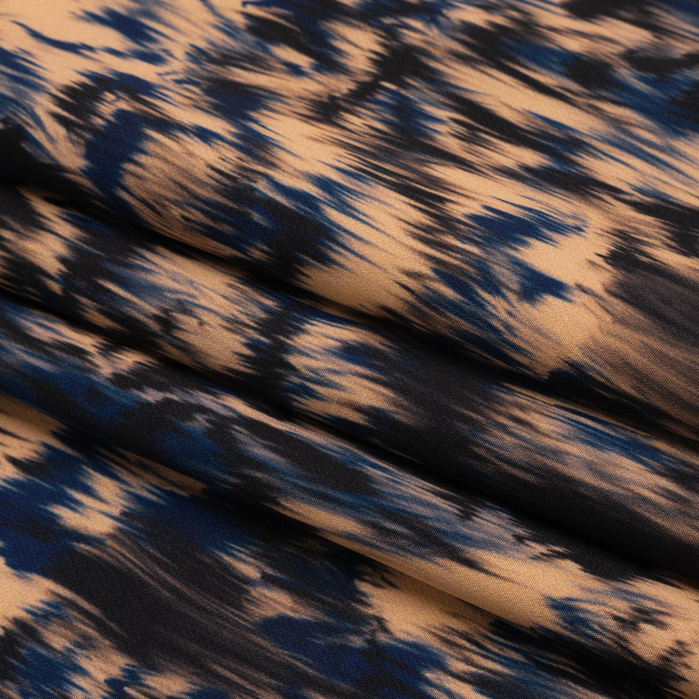Stretch Polyester Woven Print - Blue and Beige Abstract Ikat - Mood Exclusive Shifting Sands Folded Stretch Polyester Woven Print - Blue and Beige Abstract Ikat - Mood Exclusive Shifting Sands Folded
