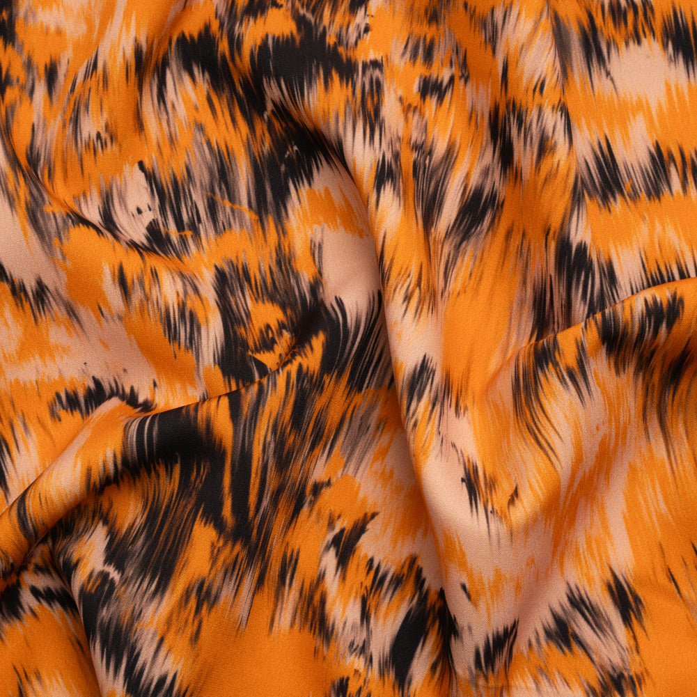 Stretch Polyester Woven Print - Orange and Black Abstract Ikat - Mood Exclusive Shifting Sands Stretch Polyester Woven Print - Orange and Black Abstract Ikat - Mood Exclusive Shifting Sands