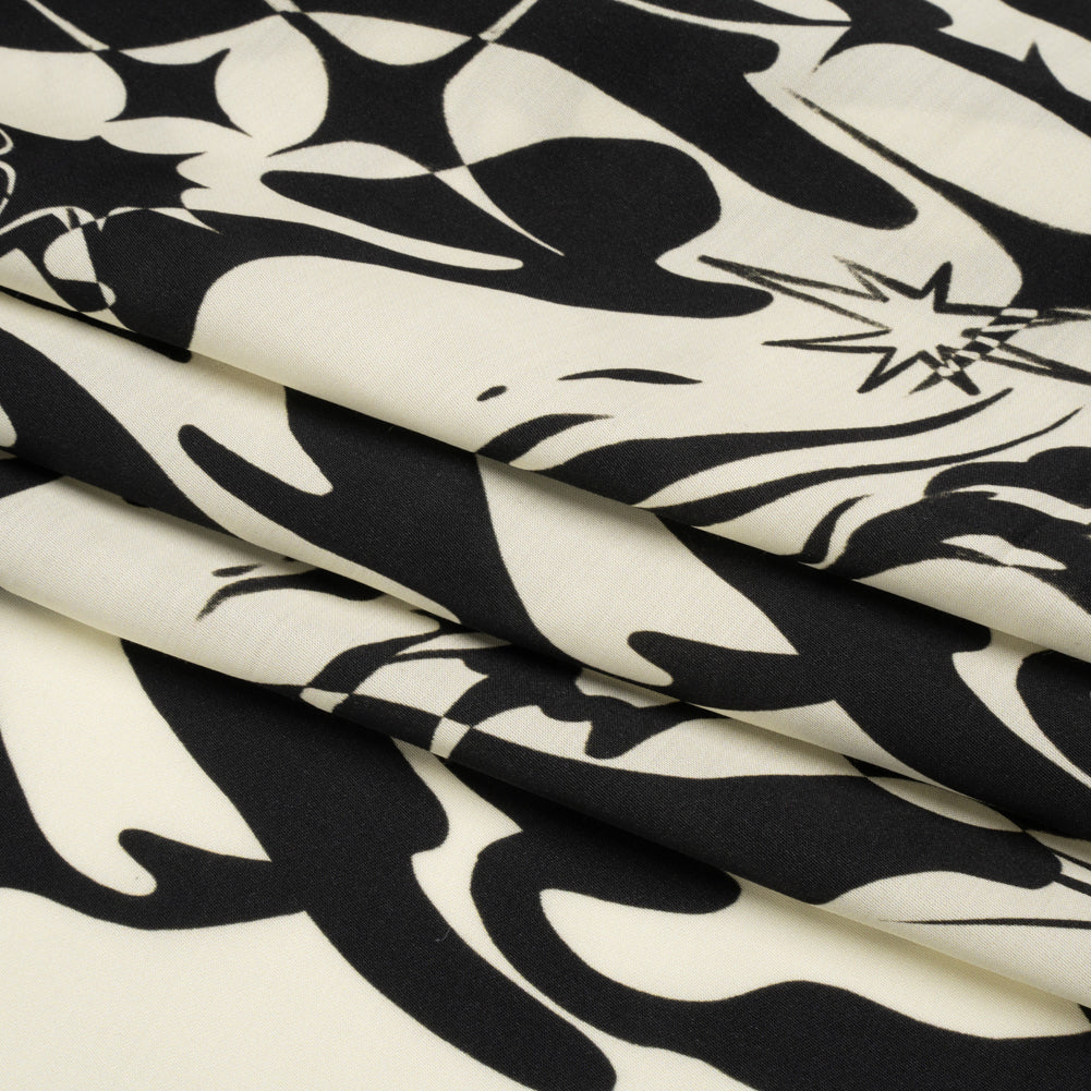 Sustainable and Recycled Viscose Satin Print - Cream and Black Abstract and Stars - Mood Exclusive Cosmic Chaos Full Sustainable and Recycled Viscose Satin Print - Cream and Black Abstract and Stars - Mood Exclusive Cosmic Chaos Full