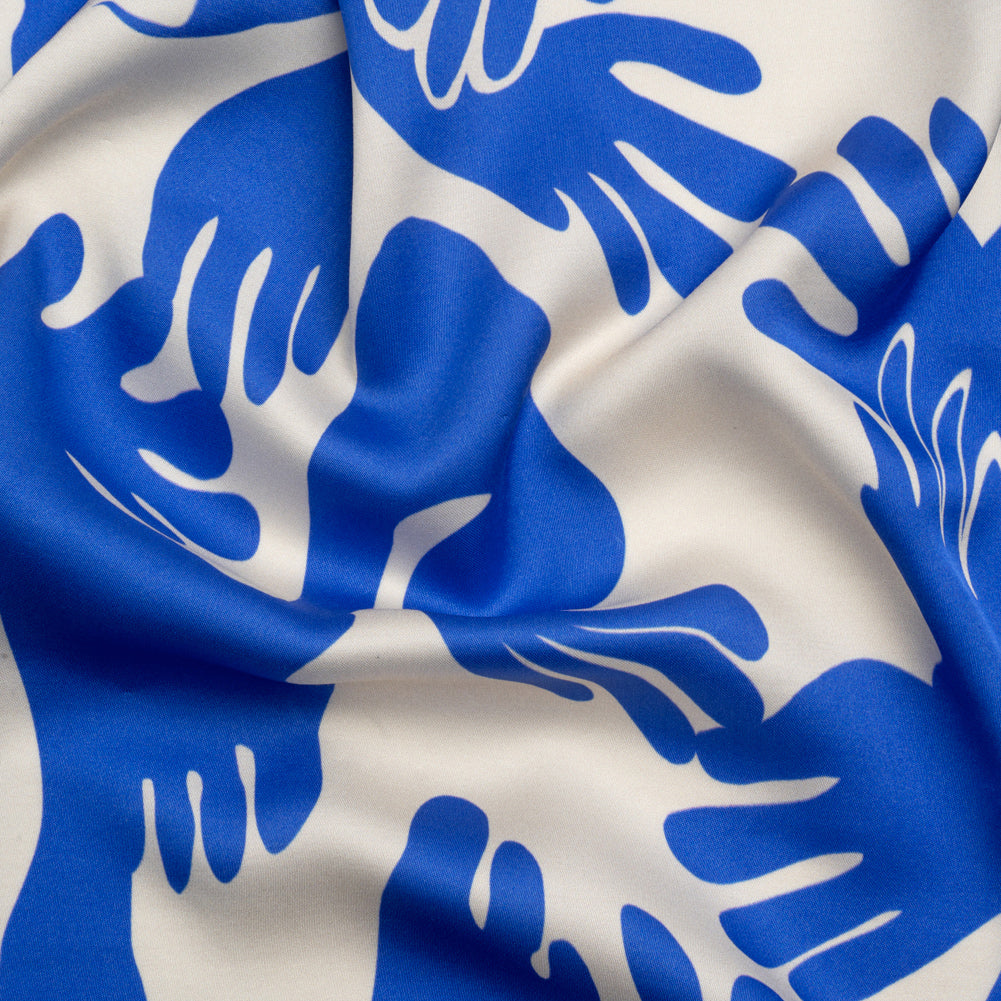 Sustainable and Recycled Viscose Satin Print - Blue and White Hands - Mood Exclusive Helping Hands Sustainable and Recycled Viscose Satin Print - Blue and White Hands - Mood Exclusive Helping Hands