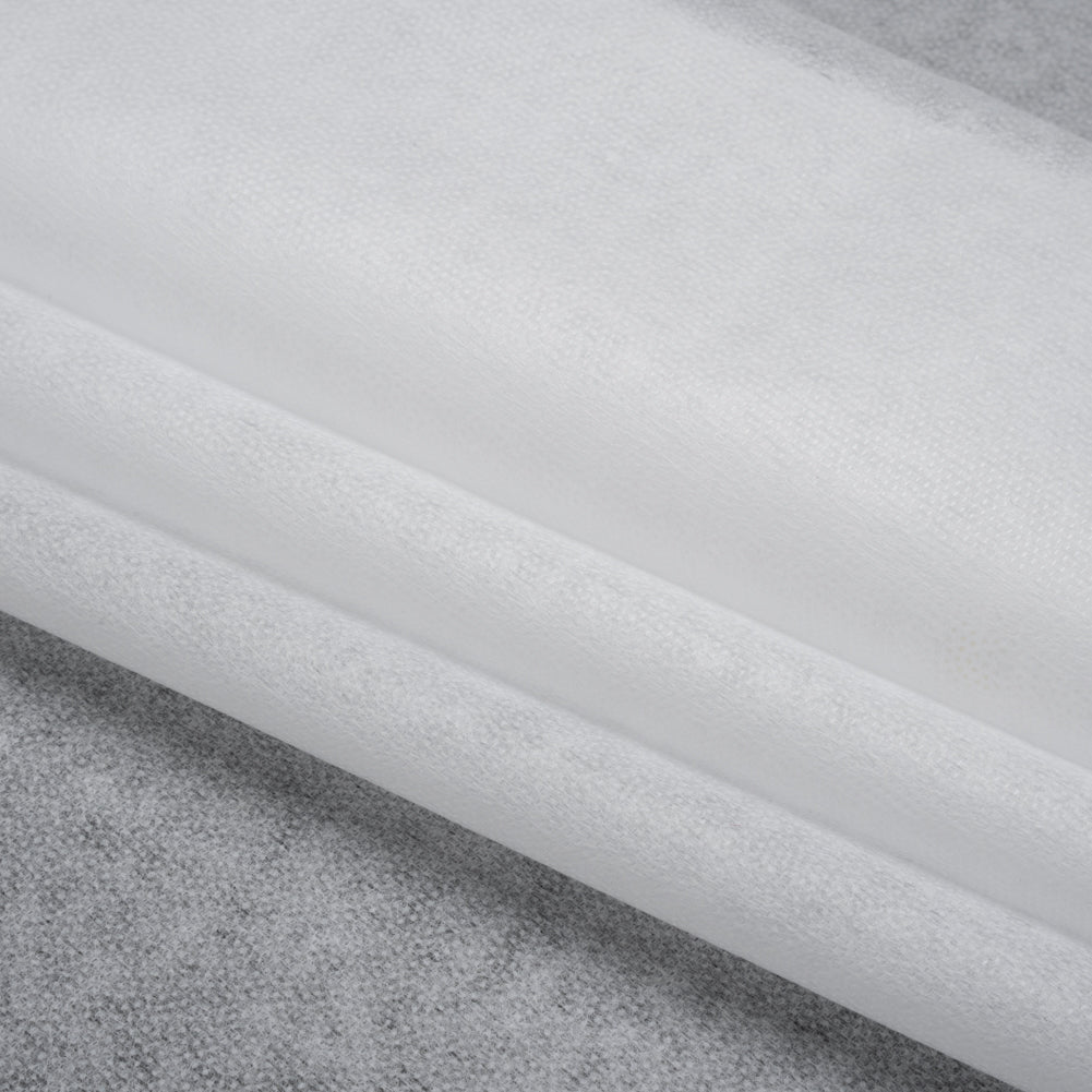 Non-Woven Fusible Interlining, Single Sided by Helmut Lang - White Folded Non-Woven Fusible Interlining, Single Sided by Helmut Lang - White Folded