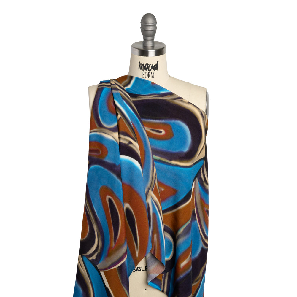 Rayon Crepe de Chine - Blue, Dark Purple and Burnt Orange Abstract Swirls - Made in Italy Detail Rayon Crepe de Chine - Blue, Dark Purple and Burnt Orange Abstract Swirls - Made in Italy Detail