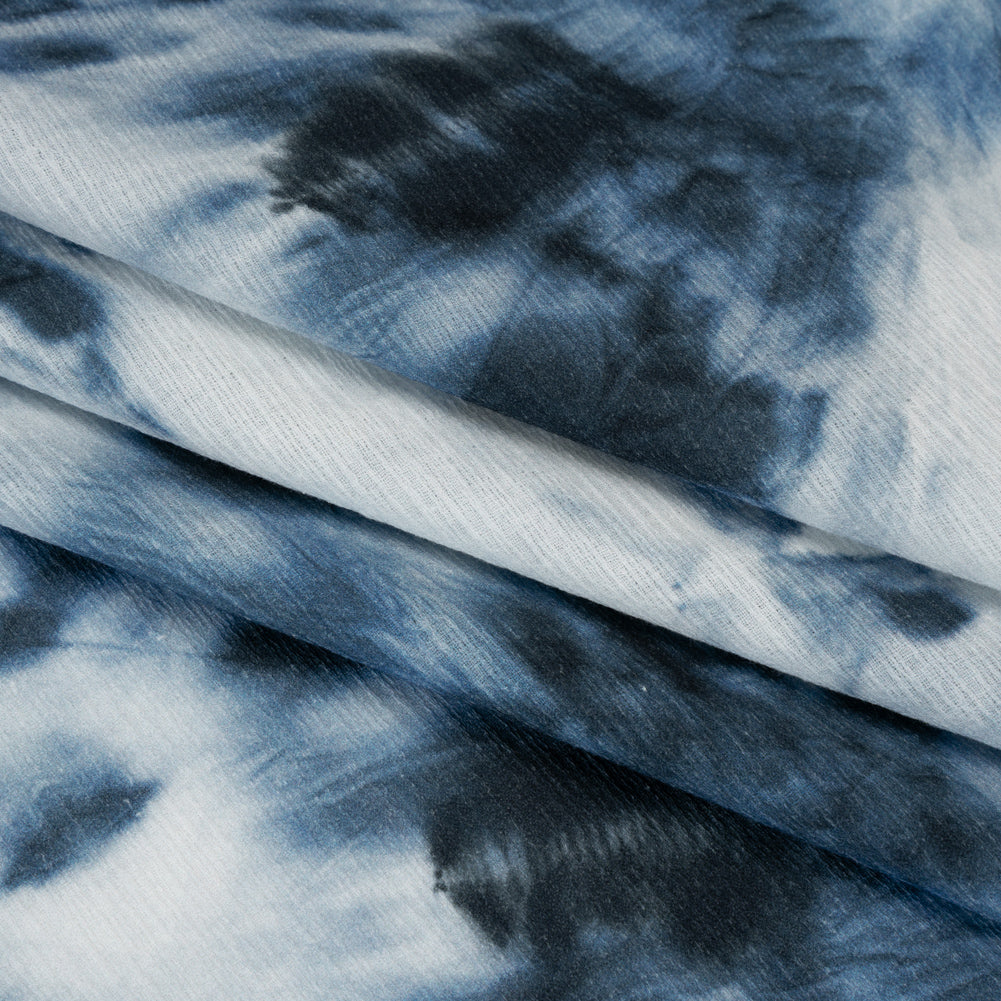 Slubbed Gauzy Cotton Woven - Denim Blue and White Tie Dye - Mood Exclusive Rorschach Revelations Print - Folded Slubbed Gauzy Cotton Woven - Denim Blue and White Tie Dye - Mood Exclusive Rorschach Revelations Print - Folded