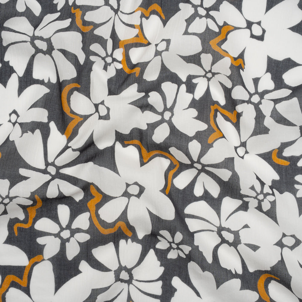 Crinkled Cotton Gauzy Woven - Charcoal Gray, Golden Orange and White Floral - Mood Exclusive Spring Squall Print Crinkled Cotton Gauzy Woven - Charcoal Gray, Golden Orange and White Floral - Mood Exclusive Spring Squall Print