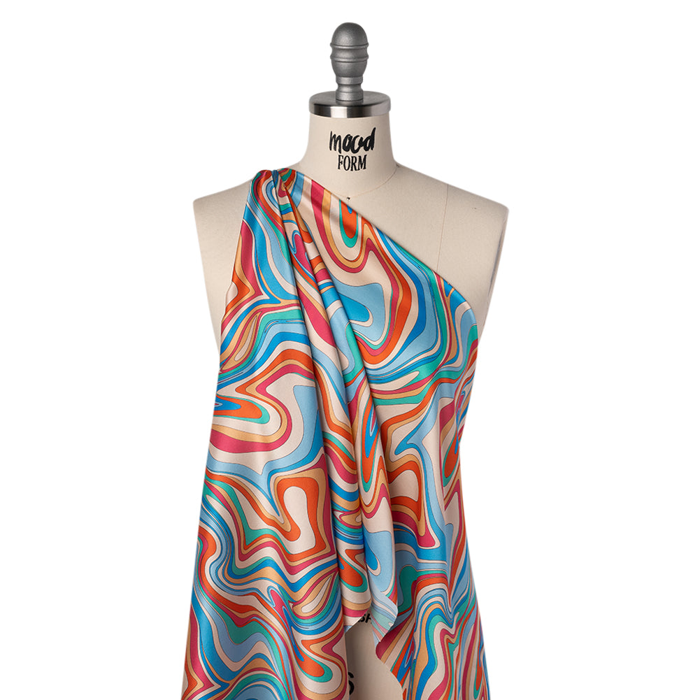 Silk Charmeuse Print 16MM, Made in Italy - Blue, Orange and Pink Retro Swirls Folded Silk Charmeuse Print 16MM, Made in Italy - Blue, Orange and Pink Retro Swirls Folded