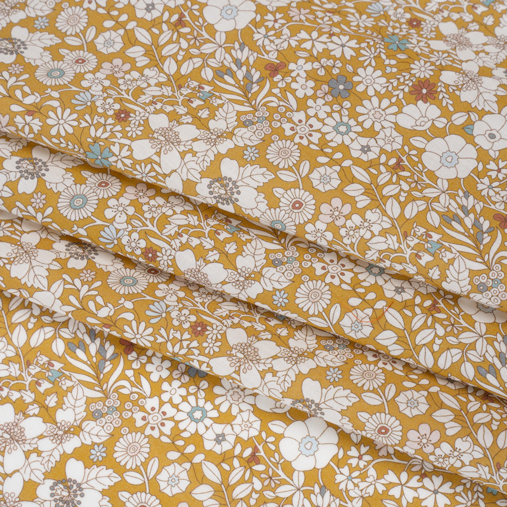 Liberty Fabrics Tana Lawn® - June's Meadow Yellow - Ochre, White and Light Blue Illustrated Flowers - Folded Liberty Fabrics Tana Lawn® - June's Meadow Yellow - Ochre, White and Light Blue Illustrated Flowers - Folded