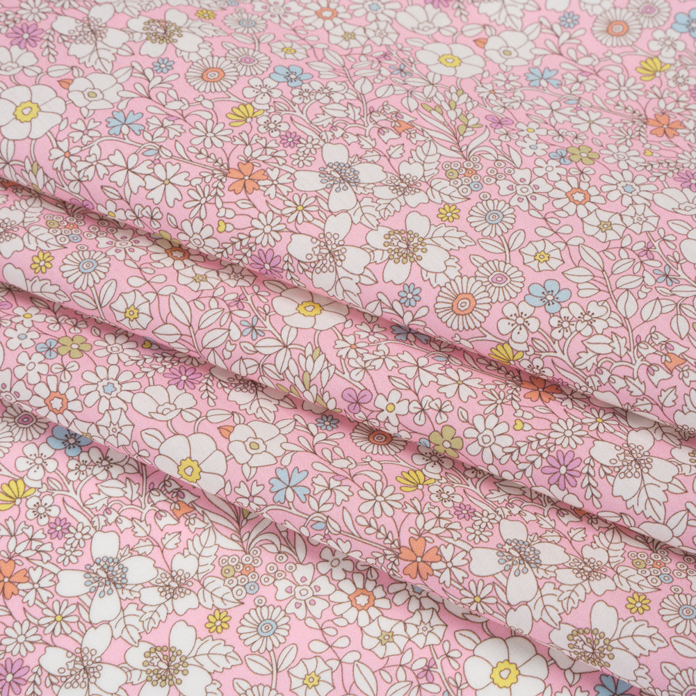 Liberty Fabrics Tana Lawn® - June's Meadow Pink - Baby Pink, White and Rainbow Illustrated Flowers Folded Liberty Fabrics Tana Lawn® - June's Meadow Pink - Baby Pink, White and Rainbow Illustrated Flowers Folded