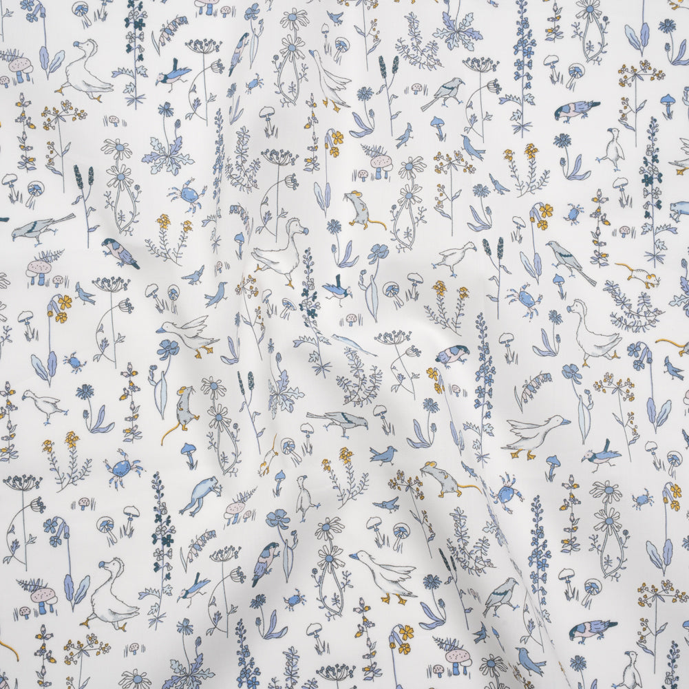 Liberty Fabrics Tana Lawn® - Theo Blue - Baby Blue, Yellow and White Cartoon Creatures and Flowers Liberty Fabrics Tana Lawn® - Theo Blue - Baby Blue, Yellow and White Cartoon Creatures and Flowers