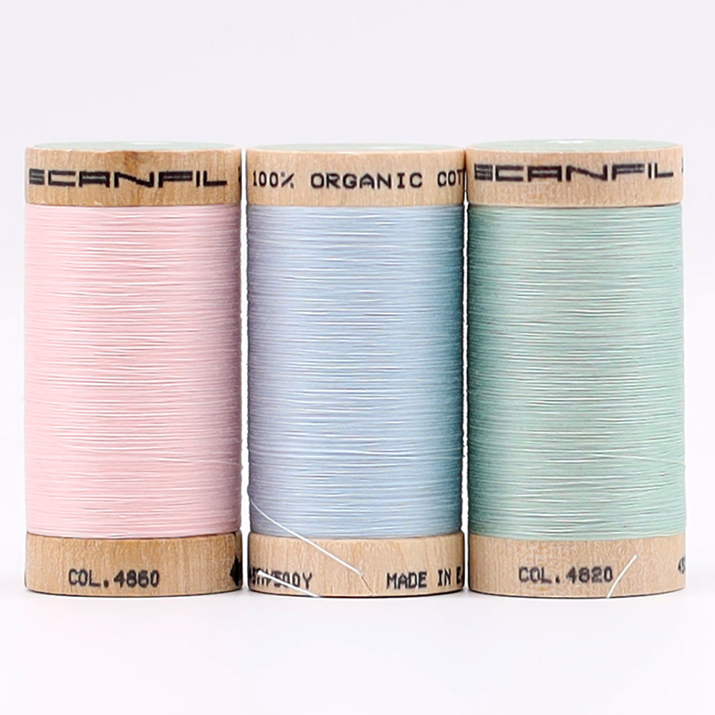 SCANFIL® 50wt Organic Pima Cotton Thread Trio Set - 3ct 500yd Spools - Baby Pastels - Detail SCANFIL® 50wt Organic Pima Cotton Thread Trio Set - 3ct 500yd Spools - Baby Pastels - Detail