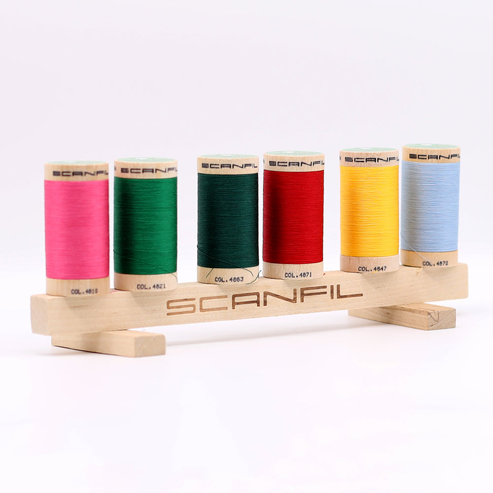 SCANFIL® 50wt Organic Pima Cotton Thread Set - 6ct 500yd Spools & Wood Rack - Trendy Holiday - Packaged - Image 10 of 11 SCANFIL® 50wt Organic Pima Cotton Thread Set - 6ct 500yd Spools & Wood Rack - Trendy Holiday - Packaged - Image 10 of 11