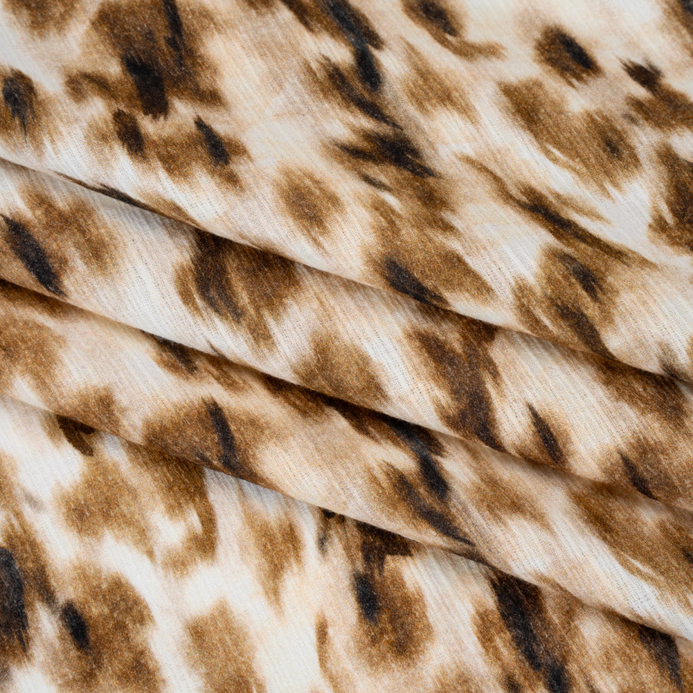 Slubbed Gauzy Cotton Woven - Cream, Brown and Black Abstracted Animal Spots - Mood Exclusive Safari Samba Print - Folded Slubbed Gauzy Cotton Woven - Cream, Brown and Black Abstracted Animal Spots - Mood Exclusive Safari Samba Print - Folded