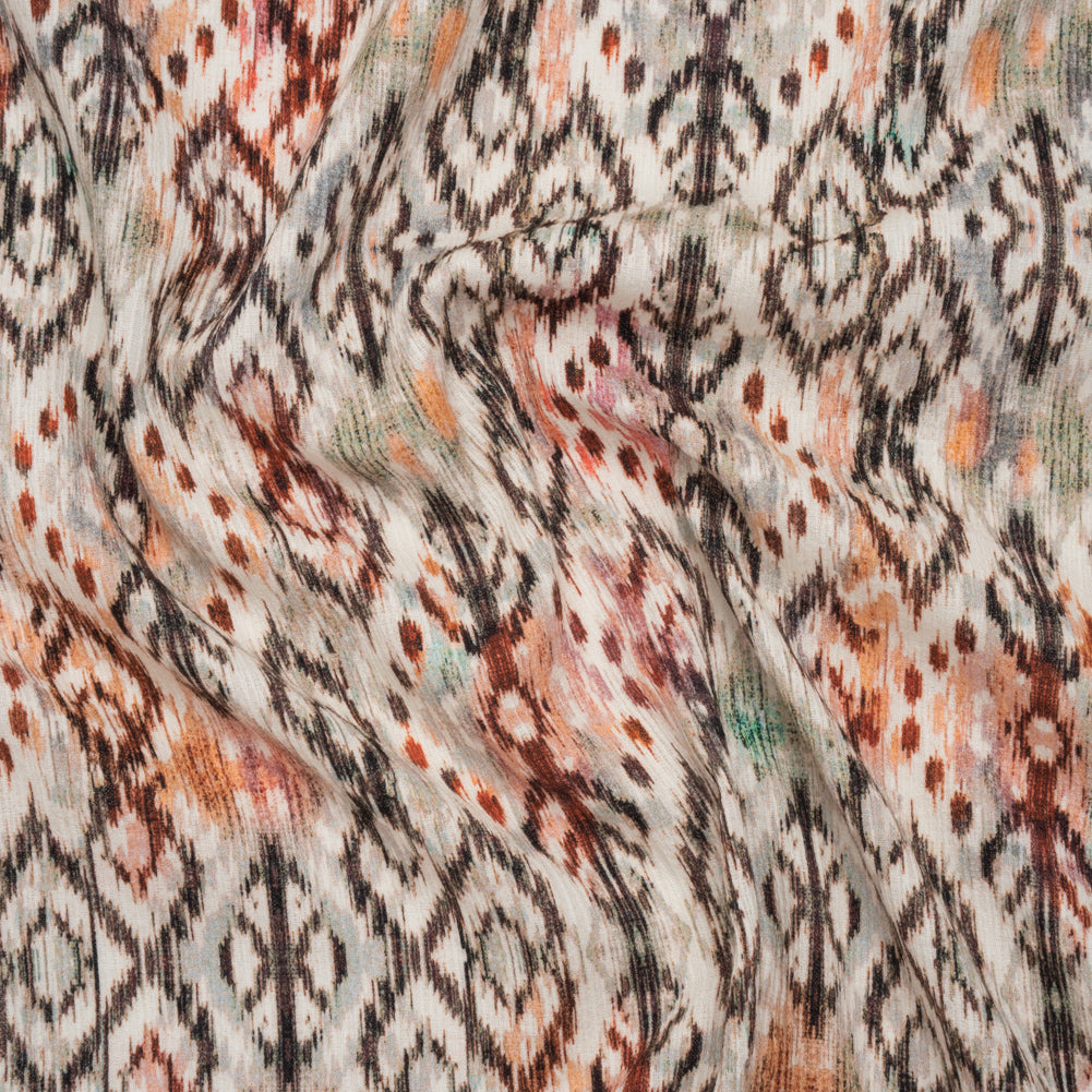 Slubbed Gauzy Cotton Woven - Red, Orange and Dark Green Geometric Ikat - Mood Exclusive Secret Symbols Print Slubbed Gauzy Cotton Woven - Red, Orange and Dark Green Geometric Ikat - Mood Exclusive Secret Symbols Print