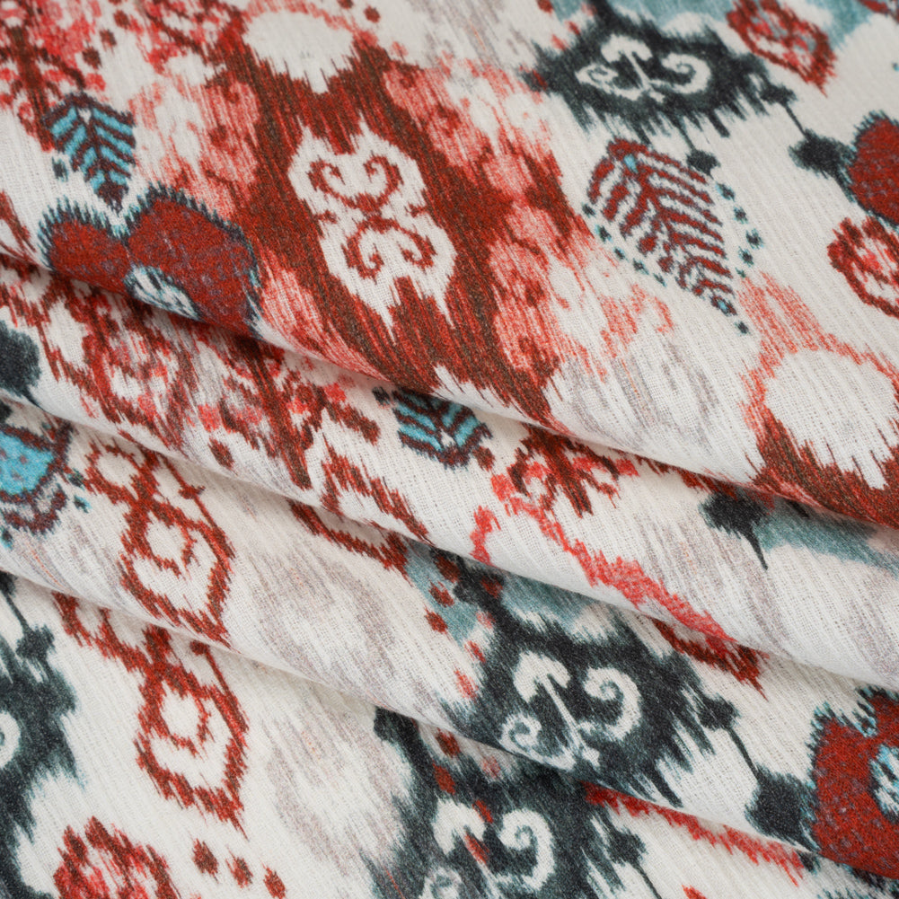 Slubbed Gauzy Cotton Woven - Coral Red, Dark Blue and Light Gray Ikat Leaves and Swirls - Mood Exclusive Fanciful Fairy Print - Folded Slubbed Gauzy Cotton Woven - Coral Red, Dark Blue and Light Gray Ikat Leaves and Swirls - Mood Exclusive Fanciful Fairy Print - Folded