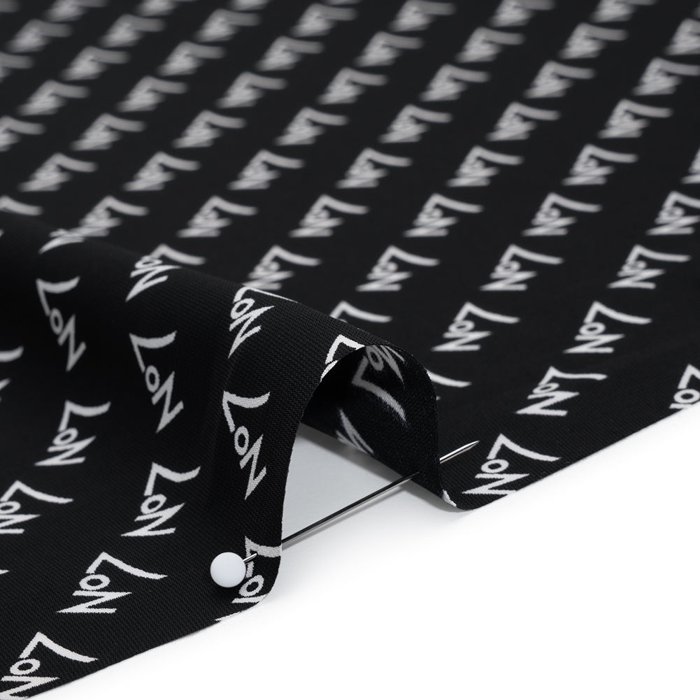 Polyester Woven Lining - Black and White No7 Typography Print - Designer Deadstock - Detail Polyester Woven Lining - Black and White No7 Typography Print - Designer Deadstock - Detail
