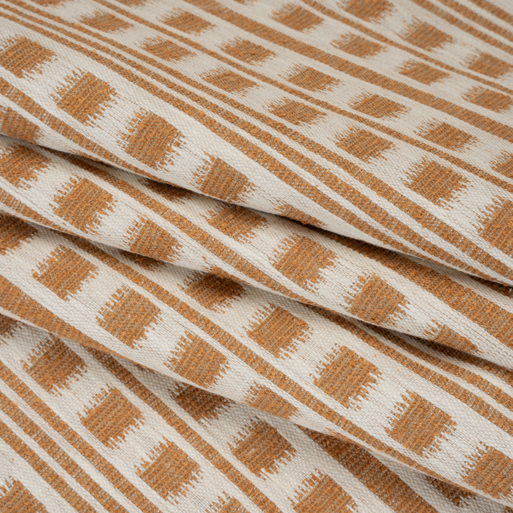 Polyester and Cotton Home Decor Jacquard - Tangerine Ikat Squares in Stripes - British Imported Folded Polyester and Cotton Home Decor Jacquard - Tangerine Ikat Squares in Stripes - British Imported Folded