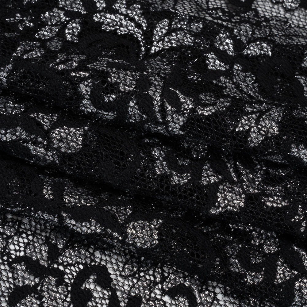 Stretch Raschel Lace with Finished Scalloped Edges - Metallic Silver and Black Flowers, Leaves and Swirls - Crina Collection - Folded Stretch Raschel Lace with Finished Scalloped Edges - Metallic Silver and Black Flowers, Leaves and Swirls - Crina Collection - Folded