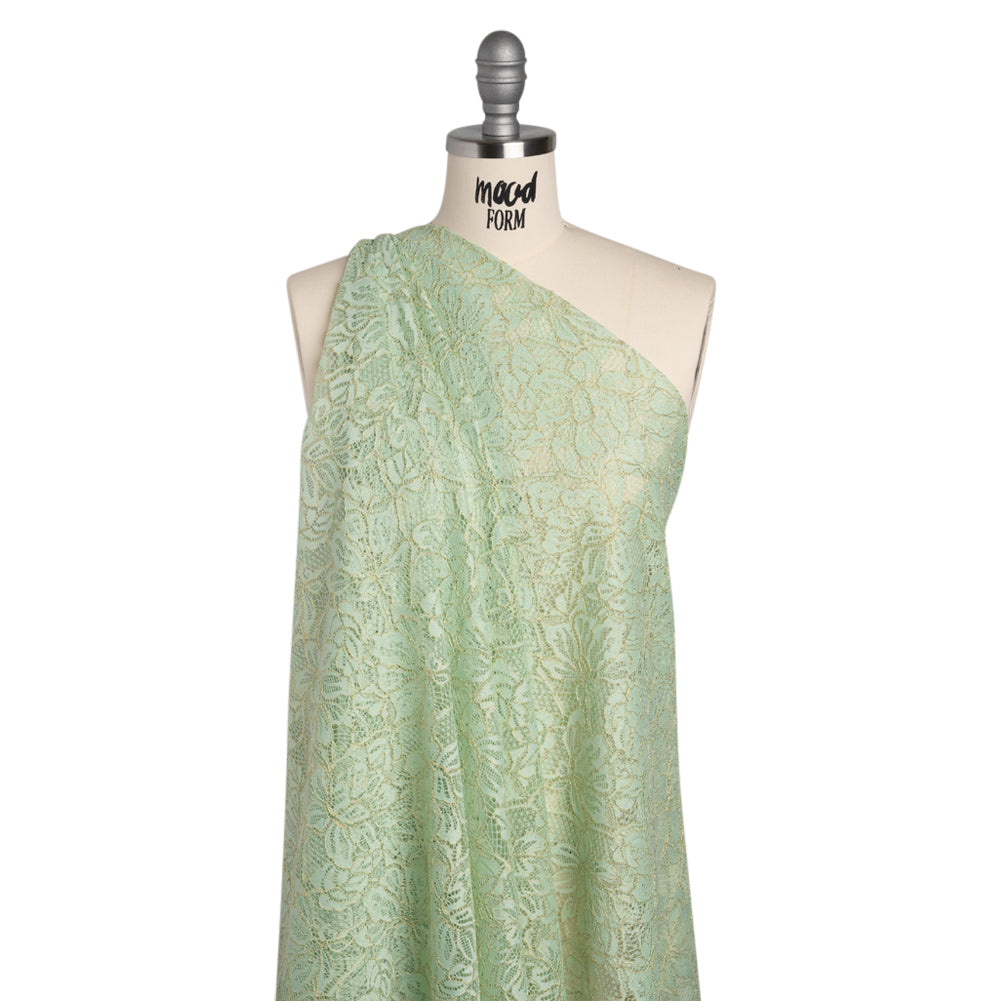 Stretch Metallic Corded Lace with Finished Edges - Dusty Aqua and Gold Tropical Blossoms - Ottilie Collection - Drape Stretch Metallic Corded Lace with Finished Edges - Dusty Aqua and Gold Tropical Blossoms - Ottilie Collection - Drape