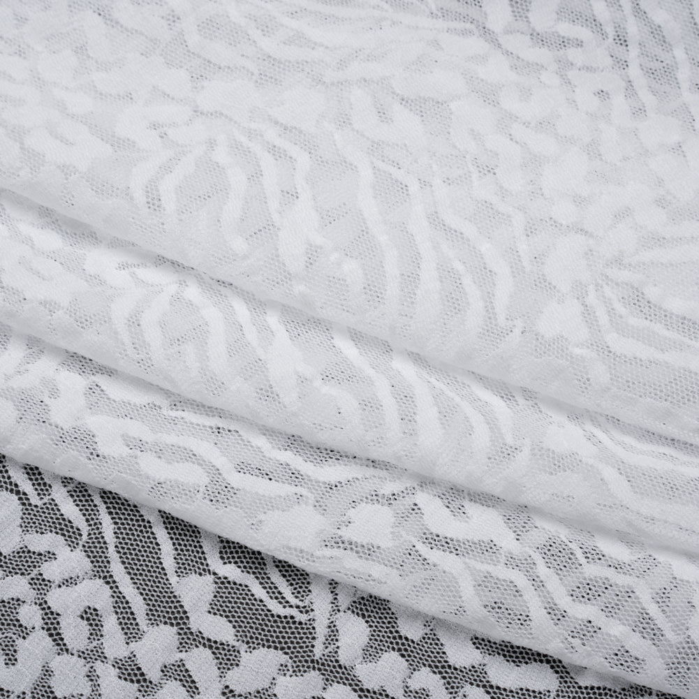 Stretch Raschel Lace - White Animal Stripes and Spots - Folded Stretch Raschel Lace - White Animal Stripes and Spots - Folded