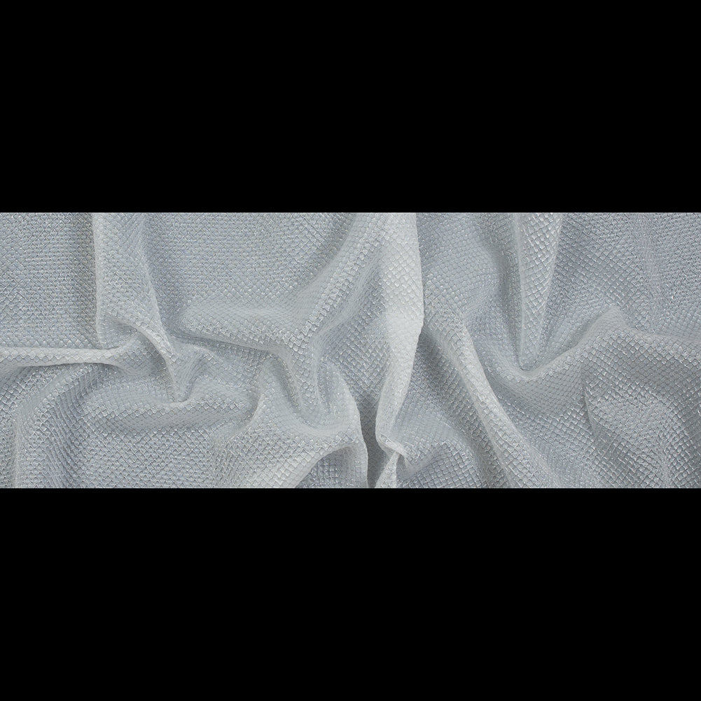 Metallic Transparent White Diamond Quilted Brocade - Folded