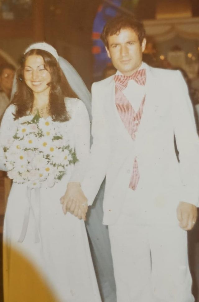 Bride and groom walking down the aisle at a wedding