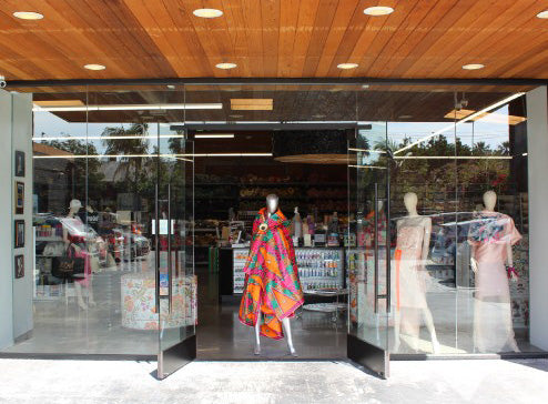 View of a store front with mannequins in the window