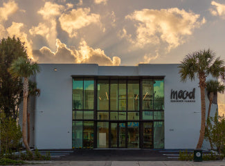 View of a building with a clock on the front of it