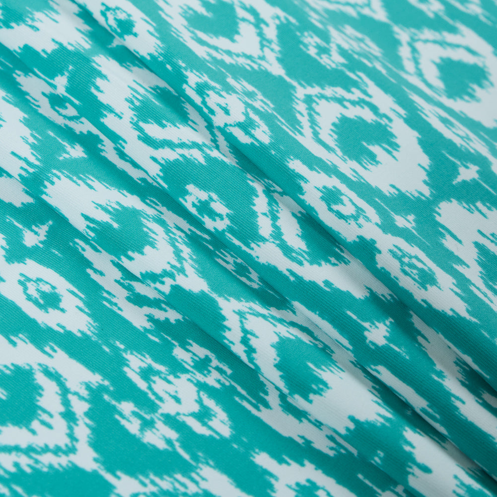 Spectra Green Ikat Printed Polyester Spandex Folded