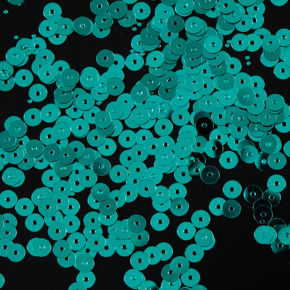 Bag of Teal Color Loose Sequins with Silver Back - 5mm