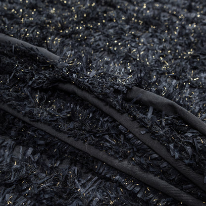 Black and Metallic Gold Fringe Fabric Folded