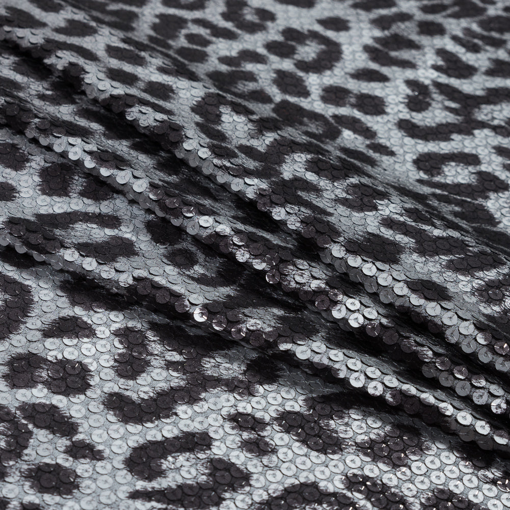 Knit Fabric with Snow Leopard Foil and Circle Sequins - Black and White on Black Folded
