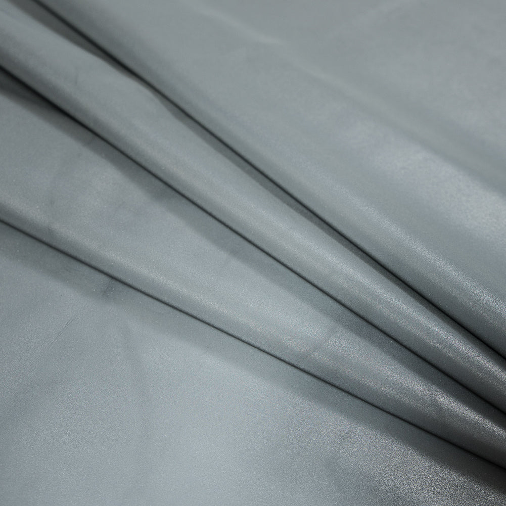 Silver Stretch Knit Reflective Fabric with White Backside Detail