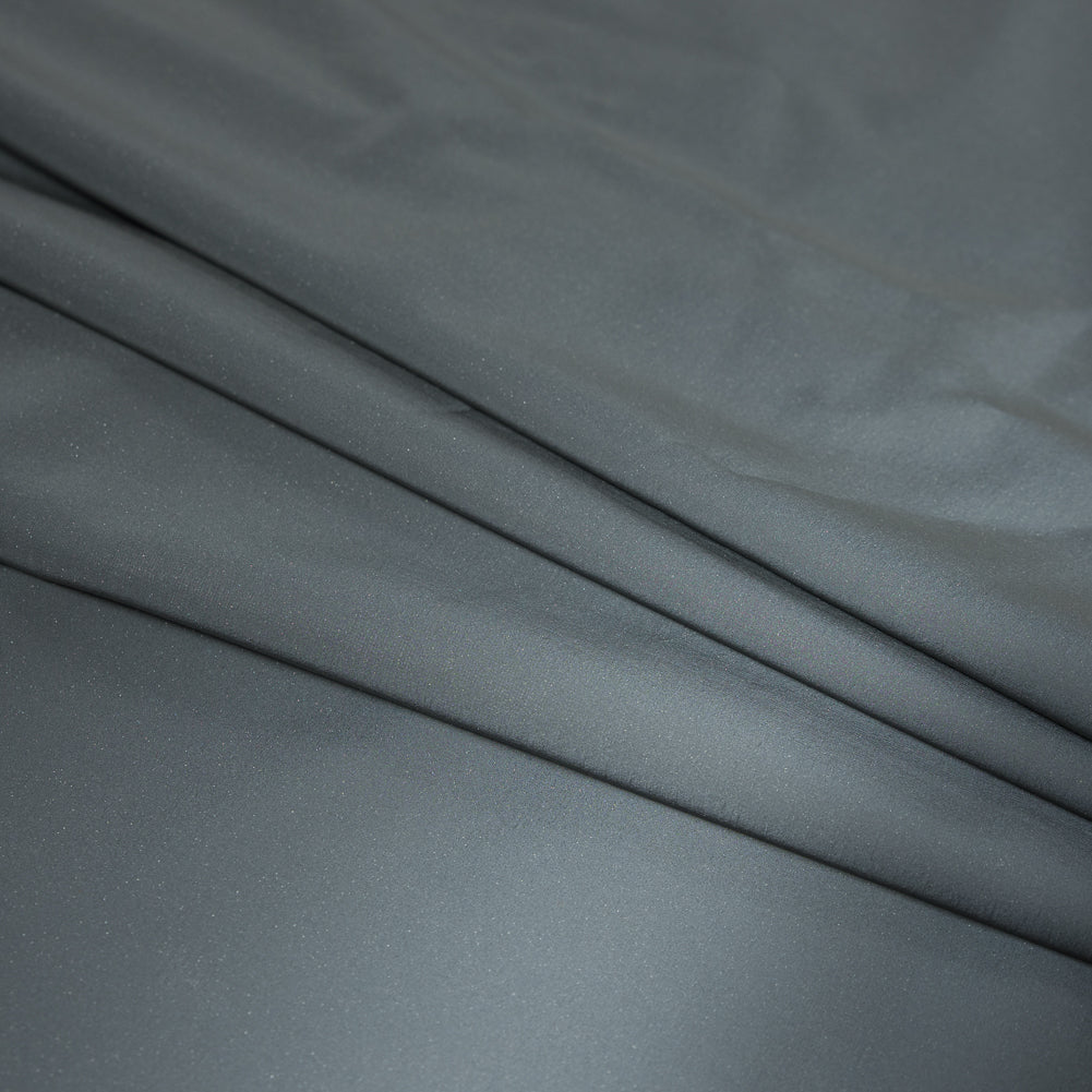 Silver on Black Fleece-Backed Reflective Fabric Detail
