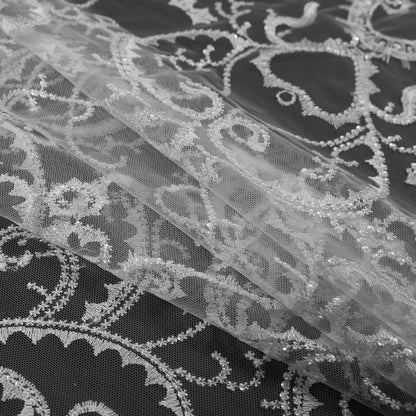 Embroidered Tulle with Sequins - White Fancy Swirls Folded