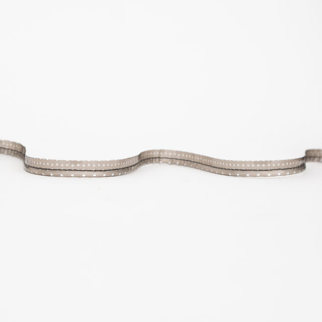 Italian White Rattail Piping with Black Perforated Plastic Casing and Lip - 0.375"