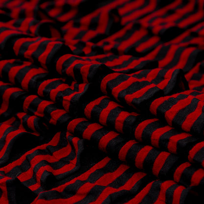 Black Polyester Jersey with Red and Black Bengal Striped Ruffles Folded