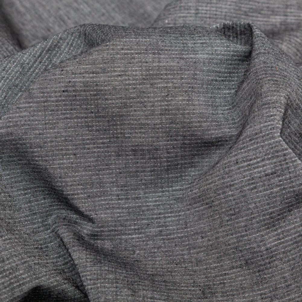 Heathered Tornado and Antarctica Reversible Perforated Cotton Chambray Detail