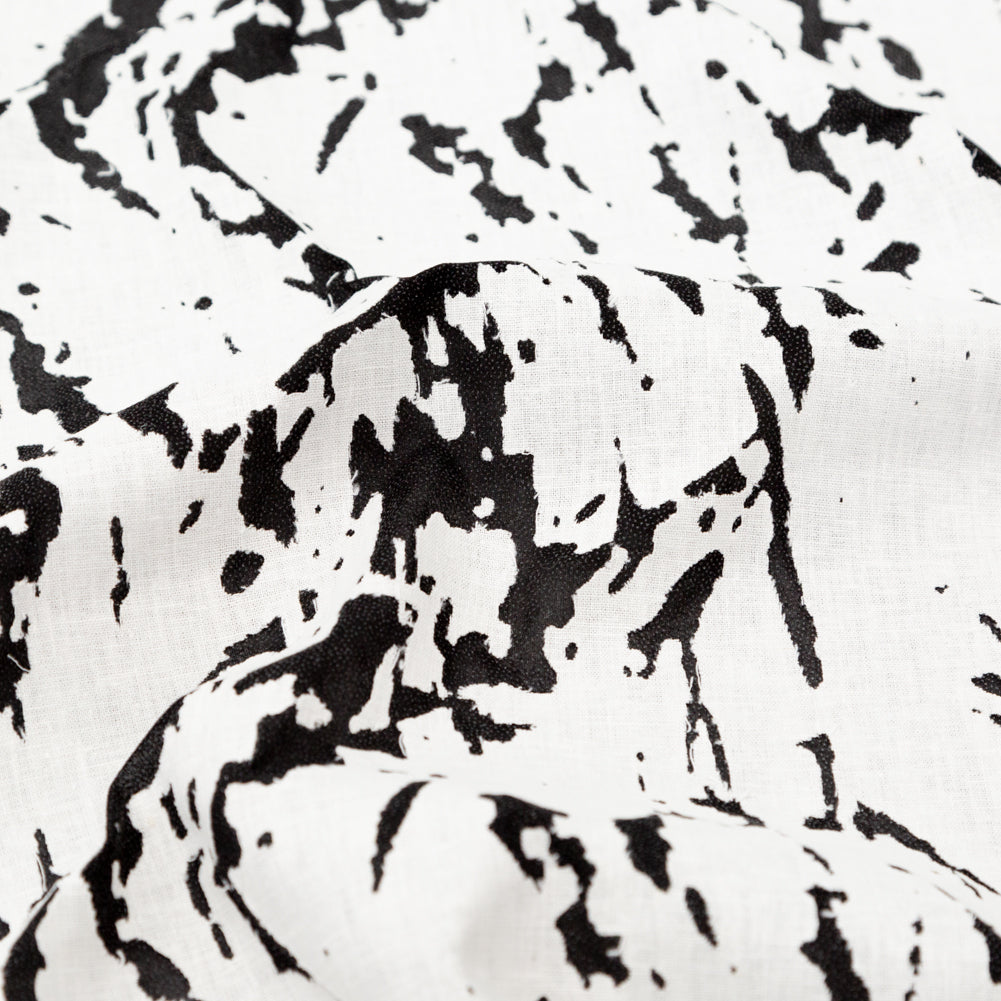 White and Black Abstract Burnout Polyester Woven with Fused Backing Detail