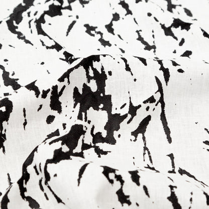 White and Black Abstract Burnout Polyester Woven with Fused Backing Detail