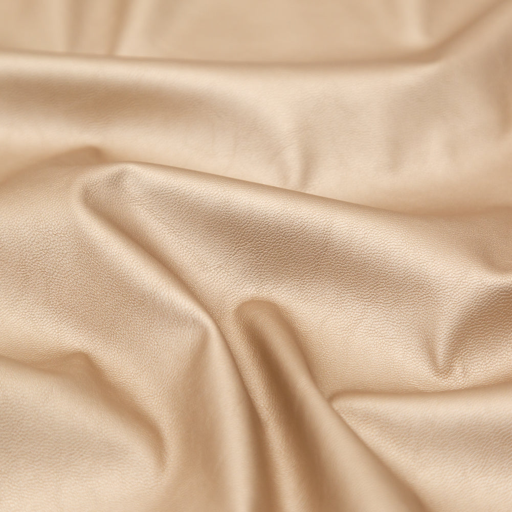 Italian Metallic Champagne Faux Leather Laminate over a Latte Stretch Faux Suede Detail