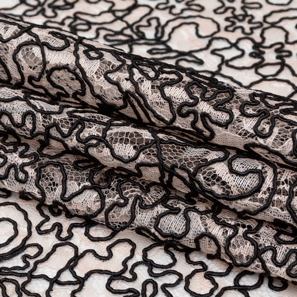 Peach Floral Chantilly Lace with Black Abstract Cording Folded