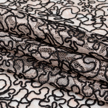 Peach Floral Chantilly Lace with Black Abstract Cording Folded