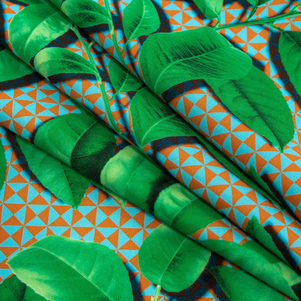 Compression Swimwear Tricot, UV Protective with Aloe Vera Microcapsules - Green Leaves and Orange Geometric - Caye Collection Folded