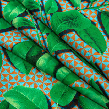 Compression Swimwear Tricot, UV Protective with Aloe Vera Microcapsules - Green Leaves and Orange Geometric - Caye Collection Folded